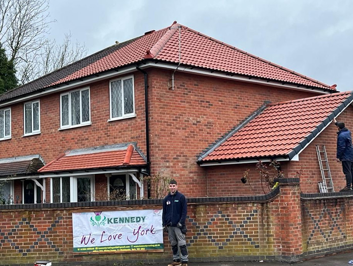 g 01a A house with a new roof | Kennedy Roofing