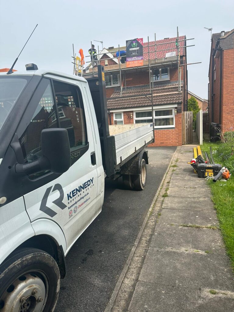 Affordable Roofers Yorkshire A van parked outside a house having a new roof | Kennedy Roofing York