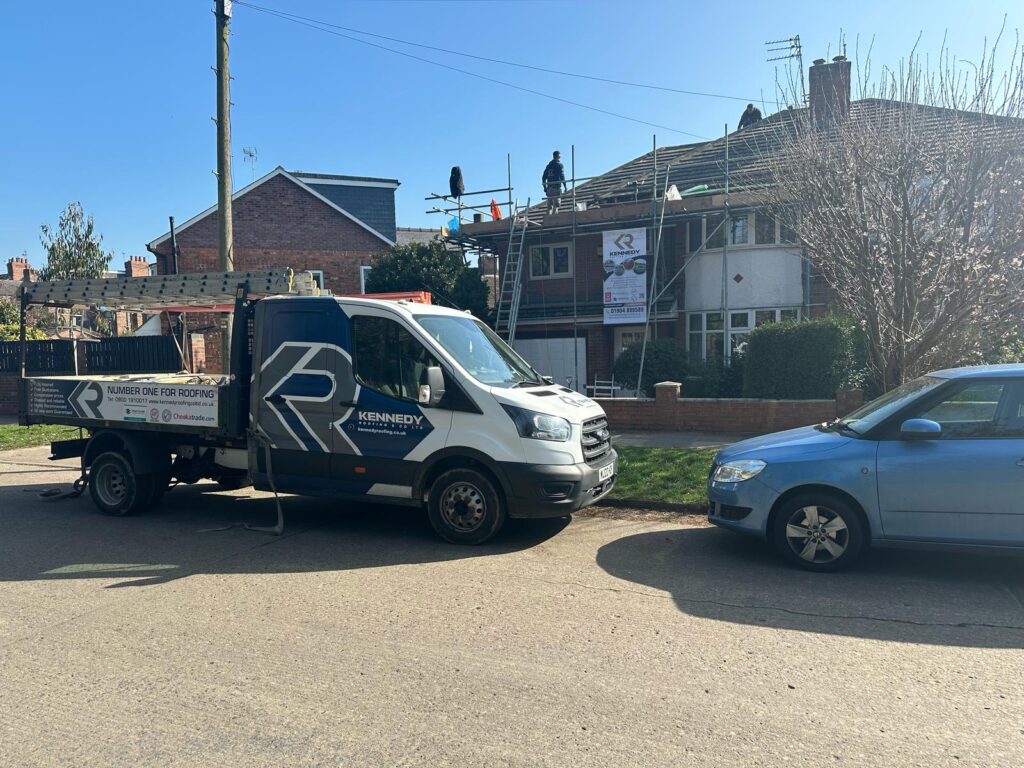 roofing services in Yorkshire A van outside a house | Kennedy Roofing York