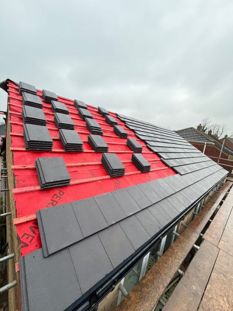 roofers york A roof being tiled | Kennedy Roofing