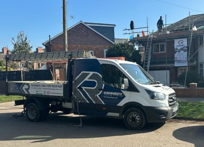 van3 A Kennedy Roofing van outside a house having a new roof
